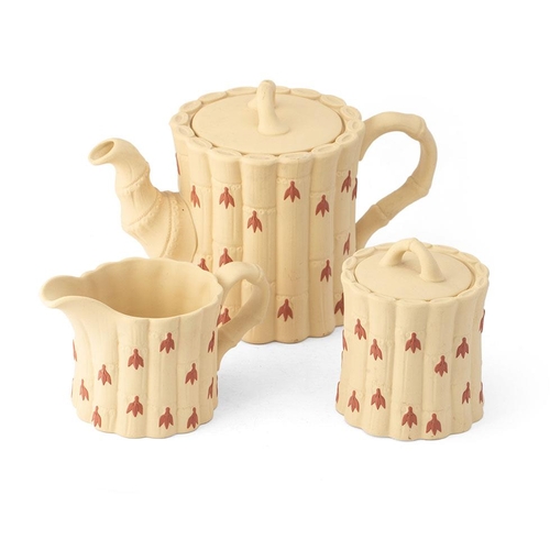 140 - Wedgwood Jasperware in yellow cane colour, with terracotta relief, to include a teapot, a milk jug a... 