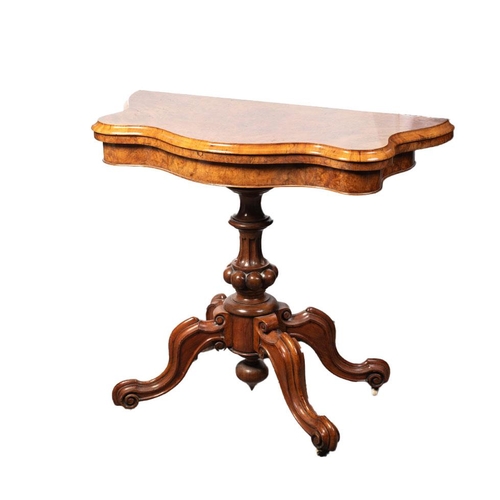 41 - Victorian burr walnut folding card table, ornate base, on four casters, felt top to interior, shaped... 