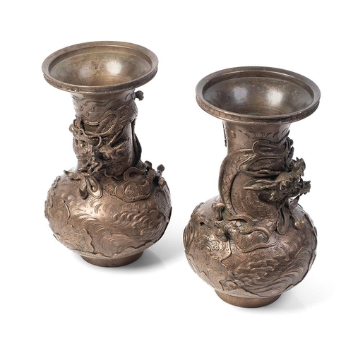 50 - A pair of Chinese bronze vases, with dragon casting, ornate, 20th century made in an 18th century st... 