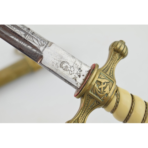 54 - WW2 Era Kriegsmarine Officers Dagger by WKC with brass fittings and etched blade bearing WKC maker m... 