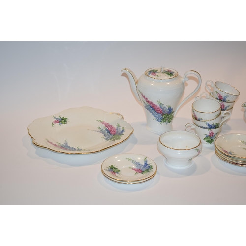 142 - Aynsley coffee service in the Delphinium pattern to include a coffee pot, 6 coffee cups, 6 saucers, ... 