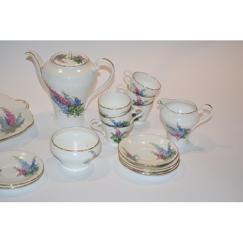 142 - Aynsley coffee service in the Delphinium pattern to include a coffee pot, 6 coffee cups, 6 saucers, ... 