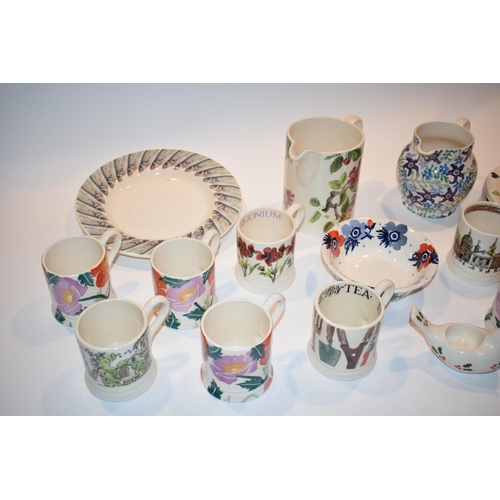 153 - Emma Bridgewater Pottery in assorted patterns to include half pint mugs, a Blue Anemone cereal bowl,... 