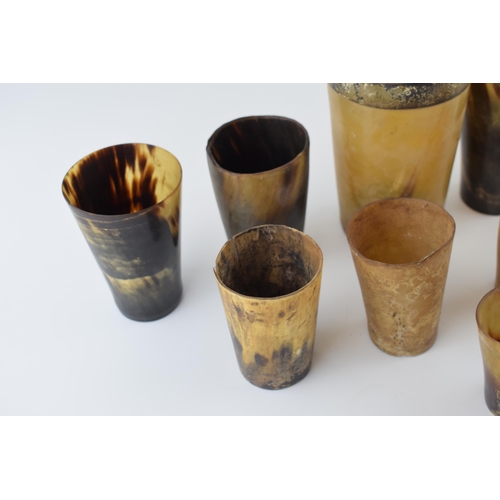 19 - A collection of horn beakers and drinking vessels, Georgian and later, one with white metal rim, ass... 