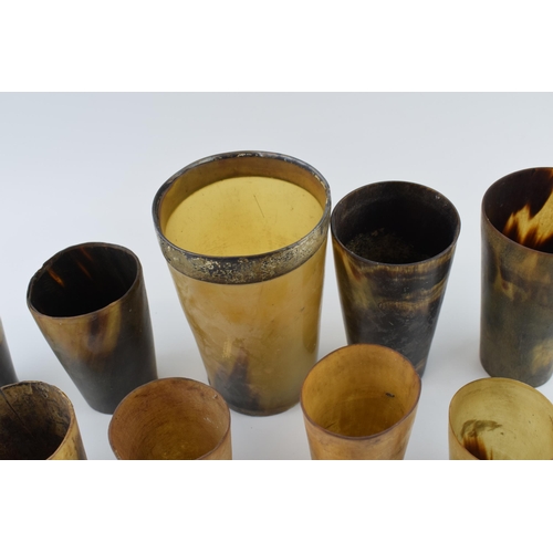 19 - A collection of horn beakers and drinking vessels, Georgian and later, one with white metal rim, ass... 