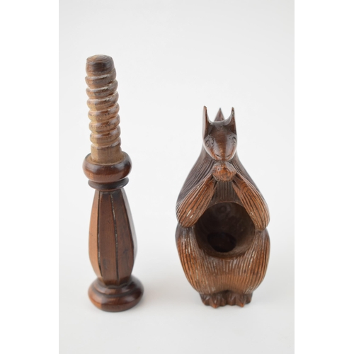 21 - 19th century fruitwood screw-action novelty nut cracker in the form of a squirrel, 17cm tall.