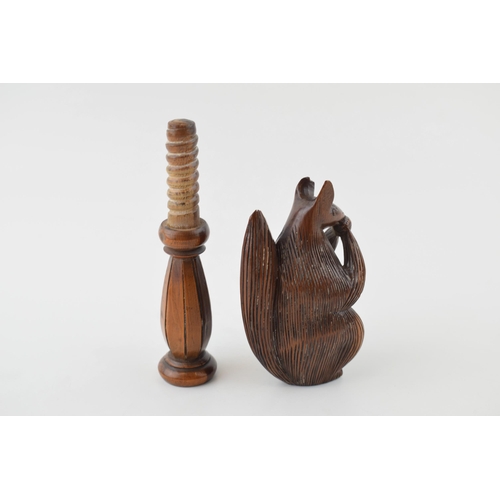 21 - 19th century fruitwood screw-action novelty nut cracker in the form of a squirrel, 17cm tall.