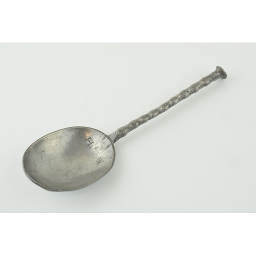 23 - Late 17th century pewter spoon with horse's hoof handle. Initials H W. c1685 - 90. Length 17.5cm.