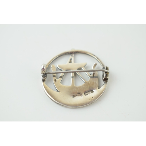 382 - Silver circular brooch, longboat decoration, hallmarked, 5.8g.