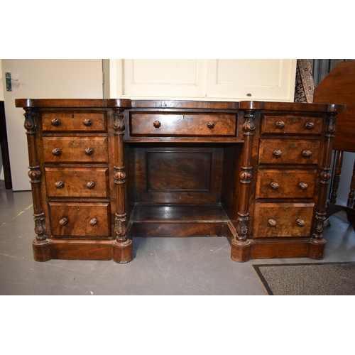 40 - Victorian burr walnut pedestal kneehole desk, breakfront, ornate handles, leather inset top, nine dr... 