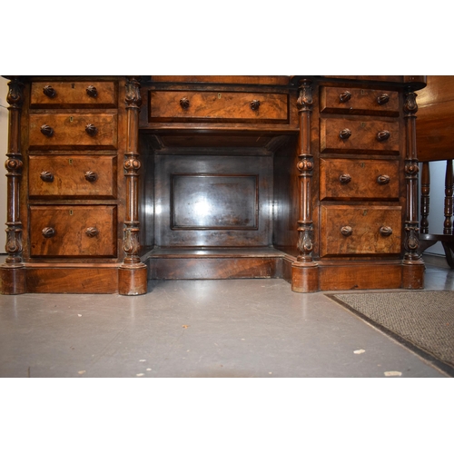 40 - Victorian burr walnut pedestal kneehole desk, breakfront, ornate handles, leather inset top, nine dr... 