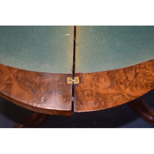 41 - Victorian burr walnut folding card table, ornate base, on four casters, felt top to interior, shaped... 