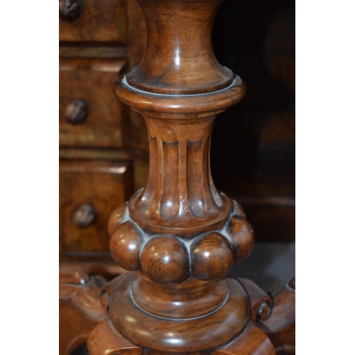 41 - Victorian burr walnut folding card table, ornate base, on four casters, felt top to interior, shaped... 