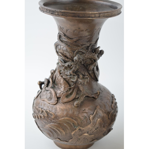 50 - A pair of Chinese bronze vases, with dragon casting, ornate, 20th century made in an 18th century st... 