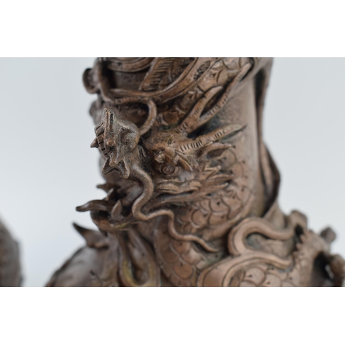 50 - A pair of Chinese bronze vases, with dragon casting, ornate, 20th century made in an 18th century st... 