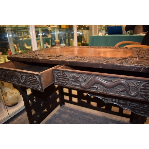 51 - Antique Chinese carved altar table, folding legs with carved figural decoration with character marks... 