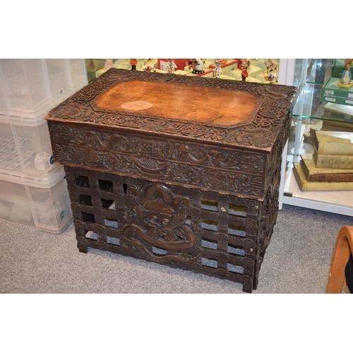 51 - Antique Chinese carved altar table, folding legs with carved figural decoration with character marks... 