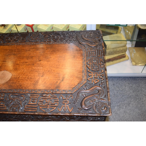 51 - Antique Chinese carved altar table, folding legs with carved figural decoration with character marks... 