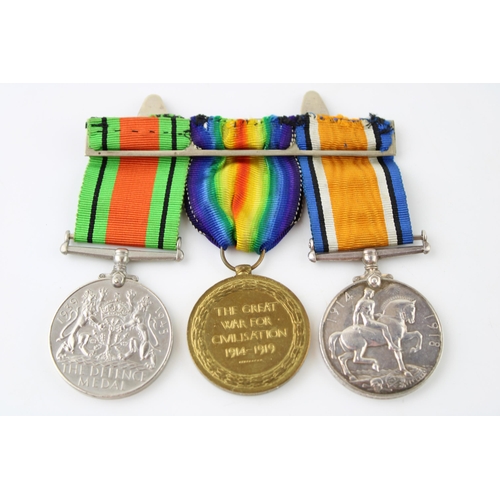 72 - A Pair of WWI medals together with a WWII Defence Medal. PTE A.H. TREADWELL 45632. (3)