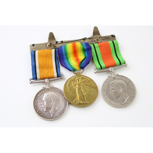 72 - A Pair of WWI medals together with a WWII Defence Medal. PTE A.H. TREADWELL 45632. (3)