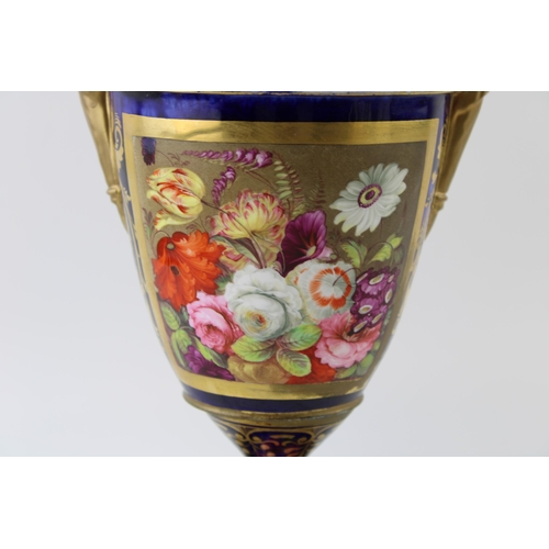 127 - 19th century porcelain vase, double handled in the form of figureheads, pink rose design, gilt highl... 