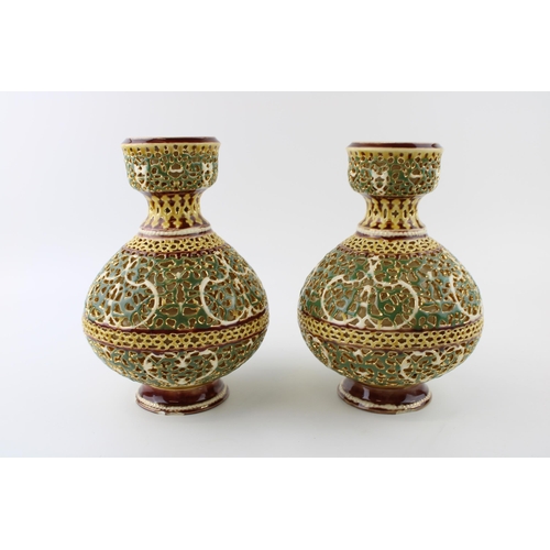 131 - Zsolnay Pecs: a pair of reticulated pedestal vases, ornate pierced decoration, predominantly decorat... 