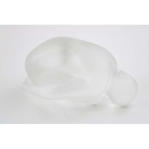 132 - Lalique frosted glass figure of a lady crouched into a ball, signed, 8.5cm long.