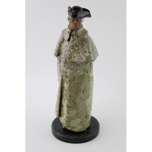 137 - A studio pottery figure of a gentleman in Tricorn hat on marble base. Indistinguishable monogram / s... 