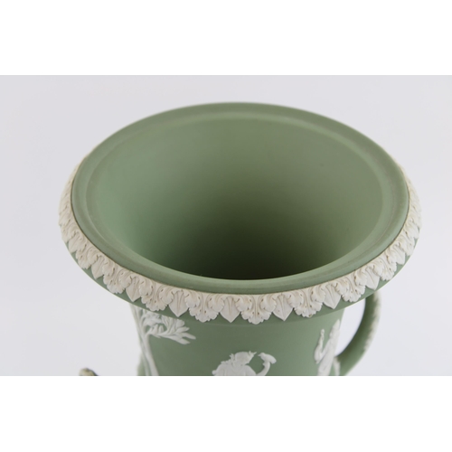 139 - A Wedgwood Sage Green Jasperware Campana Pedestal Urn Vase. Decorated with a frieze of classical fig... 