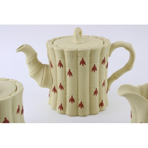 140 - Wedgwood Jasperware in yellow cane colour, with terracotta relief, to include a teapot, a milk jug a... 