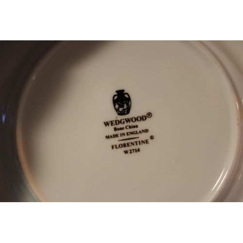 141 - Wedgwood Turqouise Florentine dinner ware to include 10 dinner plates, 27.5cm diamater, 10 dessert p... 