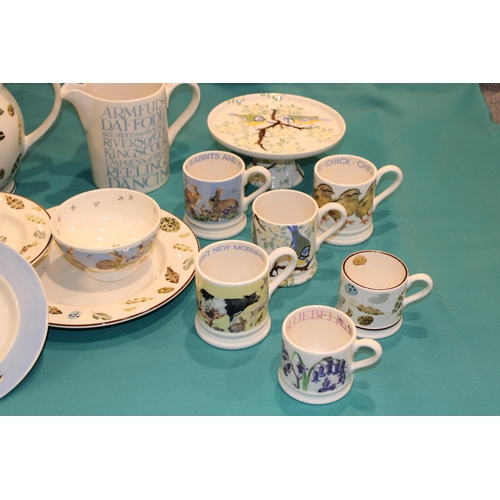 148 - Emma Bridgewater Pottery to include an Egg & Feather six pint jug (handle af), plates and mugs, a Bl... 