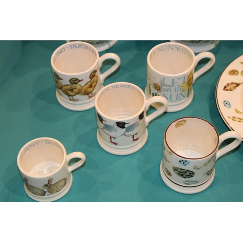 148 - Emma Bridgewater Pottery to include an Egg & Feather six pint jug (handle af), plates and mugs, a Bl... 