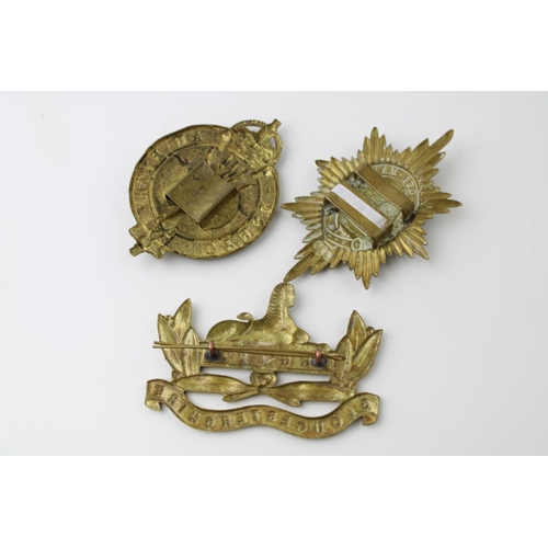 60A - Set of three WW2 British Army helmet plate badges including Gloucestershire Regiment, Worcestershire... 