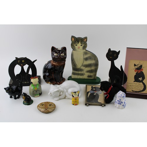 192 - A collection of vintage cat related items to include pottery figures, art deco wood and original art... 