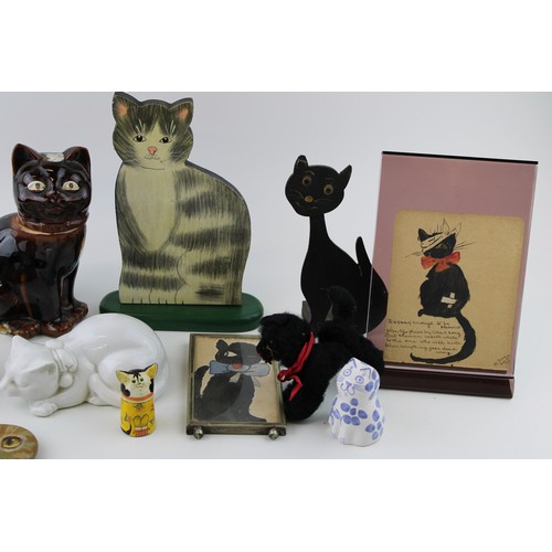 192 - A collection of vintage cat related items to include pottery figures, art deco wood and original art... 