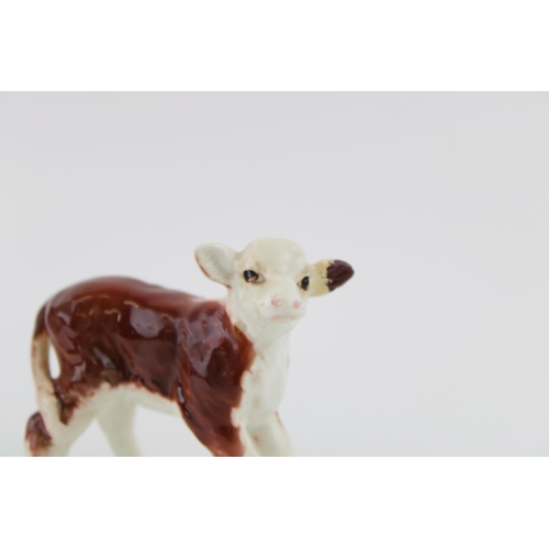 44 - Beswick Hereford Cow (grazed ear) with a Hereford Calf (ear repaired) (2).