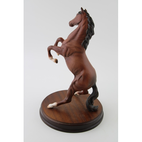 5 - Beswick Spirit of the Wild in matte brown on wooden base.