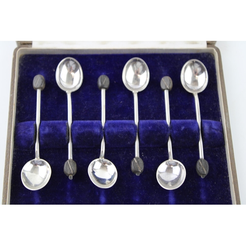 11 - Boxed set of six silver coffee spoons, coffee bean finials, 55.2g, Birmingham 1912.