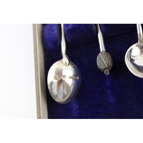 11 - Boxed set of six silver coffee spoons, coffee bean finials, 55.2g, Birmingham 1912.