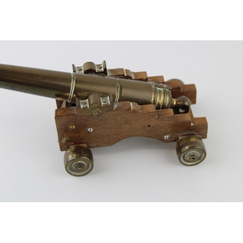 15 - Vintage brass and wood cannon model, 19cm long.