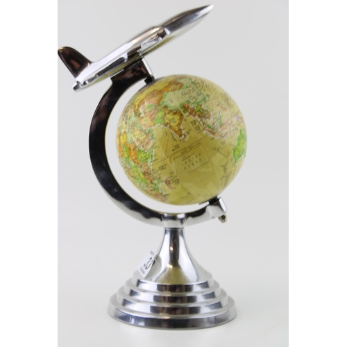 33 - An Art Deco style globe with aeroplane design in chrome to surround. Height 30cm.