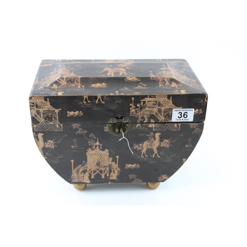 36 - Chinese lacquer work style box on round feet with metal clasp. Height 23cm.