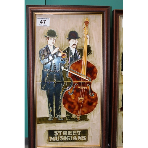 47 - Two framed Maws & Co tiles to include the Street Musicians and Baked Potato Man (2), 46cm x 24cm.