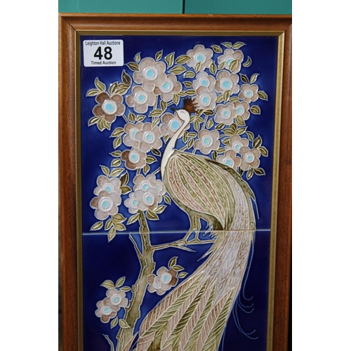 48 - Maws & Co framed trio of tiles of a peacock nesting in a tree, 64cm tall.