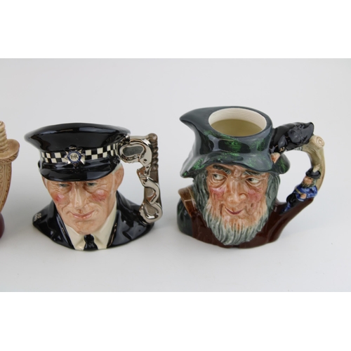 53 - Small Royal Doulton character jugs to include The Policeman, Rip Van Winkle (lighter jug) and others... 