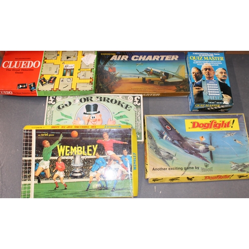 65 - A collection of vintage board games to include, Waddington's 'Air Charter', 'Cludo' Vic-Toy 'Go For ... 