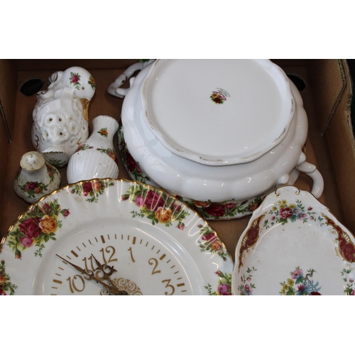 67 - A collection of Royal Albert items to include dinner ware and novelty items in the 'Old Country Rose... 