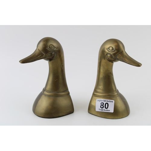 80 - A pair of vintage cast brass bookends in the form of ducks, 16cm tall (2).