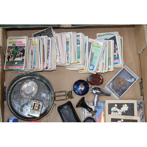 85 - A mixed collection of items to include, vintage football cards, three original artworks of poodle, v... 